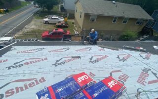 Landmark Roofing Worker During A Residential Roof Replacement Project In Pasadena Maryland